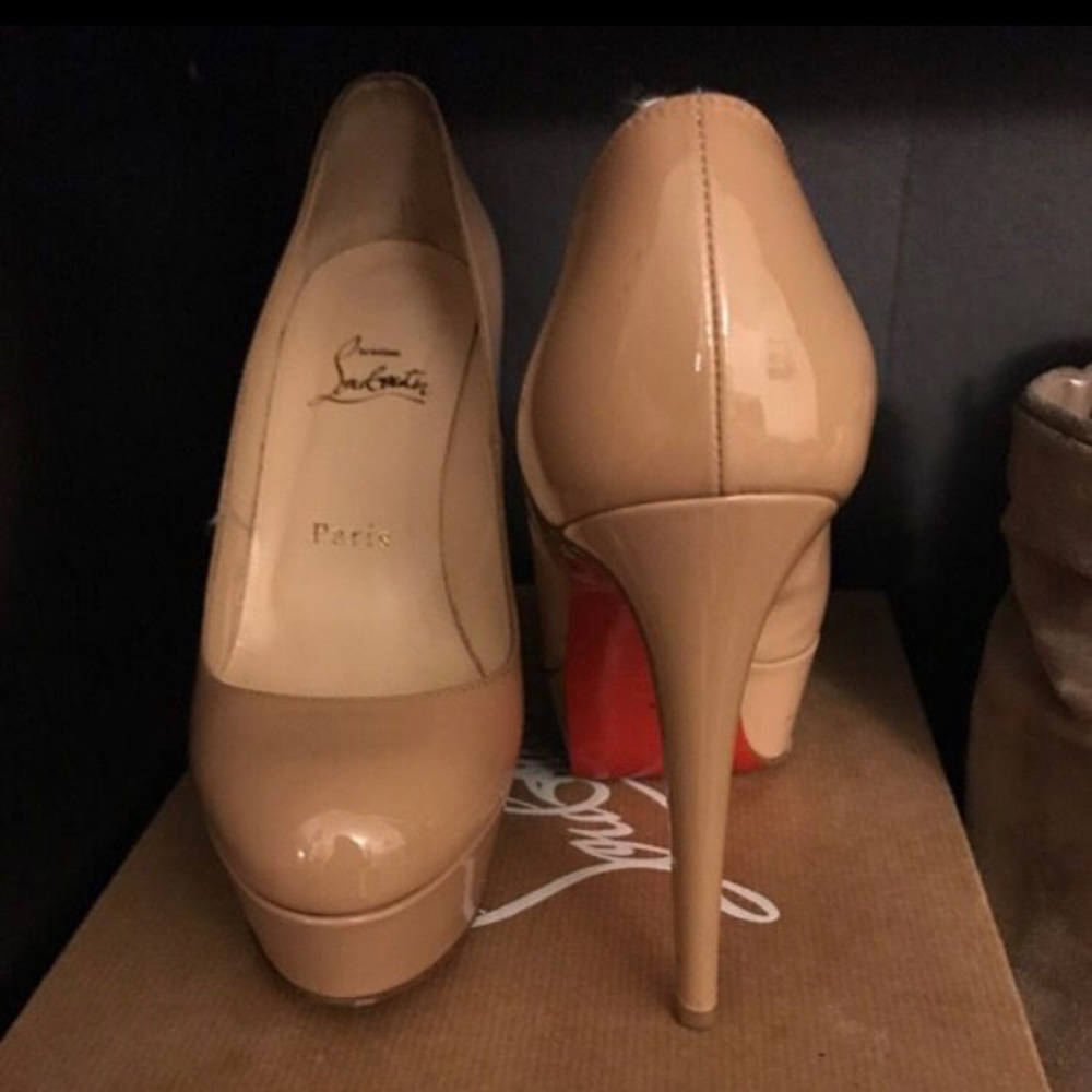 Louis Vuitton Red Bottoms They are worn and scratched on the bottom